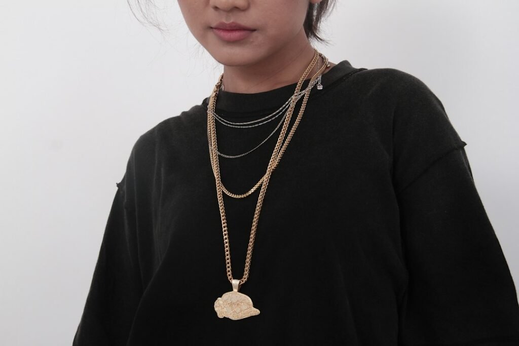 How to Layer Necklaces Without Making Your Look Feel Too Busy