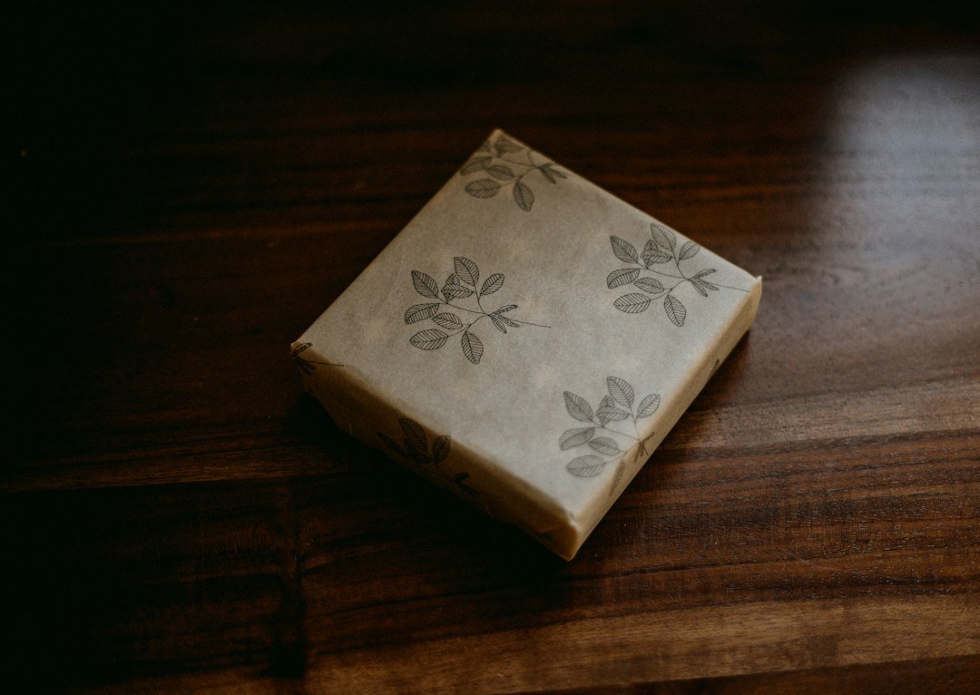 A box sitting on top of a wooden table